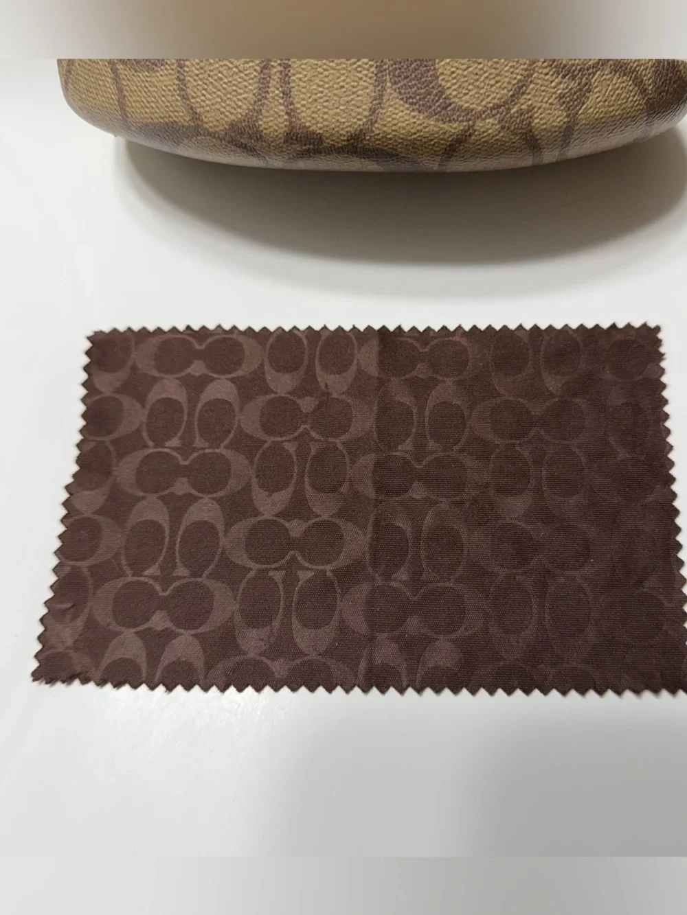Coach signature brown